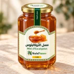عسل الكاليتوس - 1 كغ — صورة جانبية للبرطمان